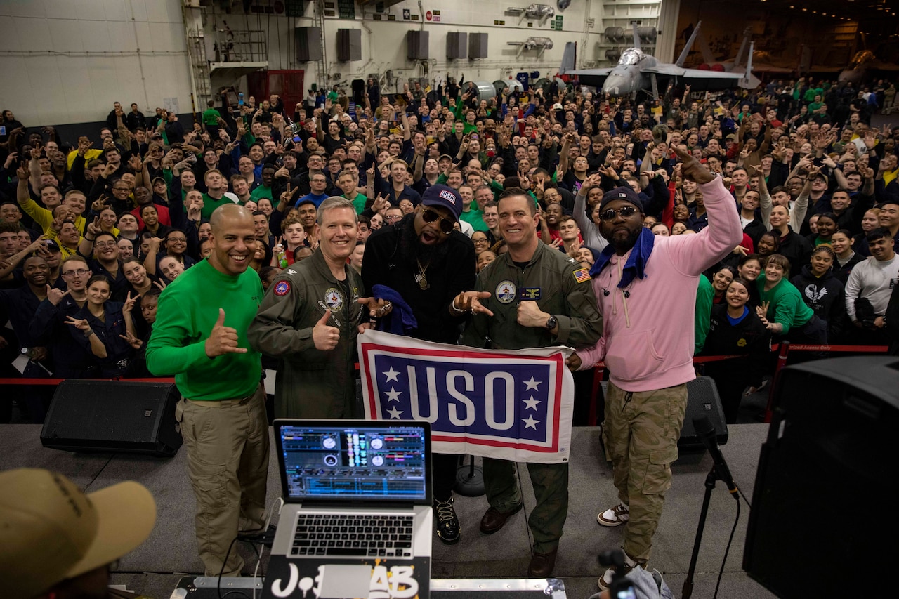 Sailors Line Dance With Musician Blanco Brown During USO Tour