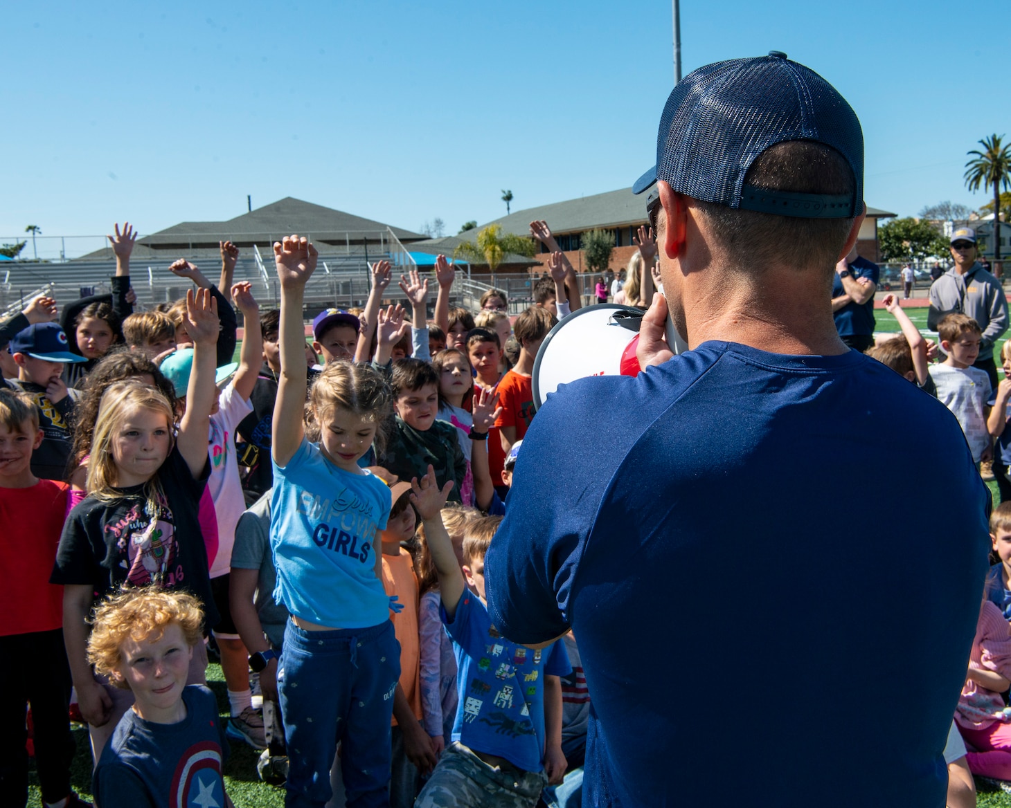Naval Special Warfare Operators Demonstrate Safety, Teamwork, Fitness to 100 Elementary Students