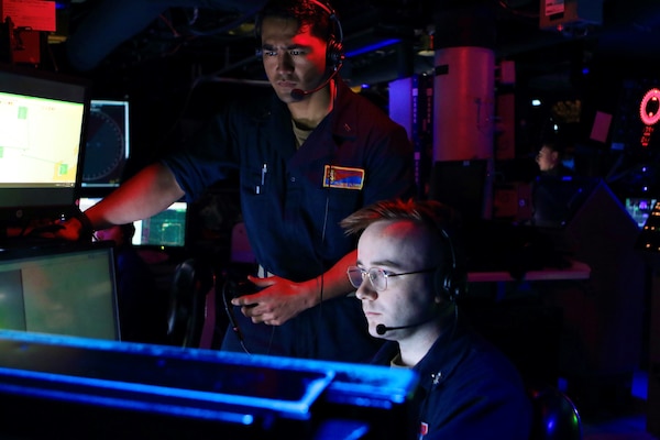 Sailors stand watch in the Combat Information Center aboard Arleigh Burke-class guided-missile destroyer USS Benfold (DDG 65) during a trilateral ballistic missile defense exercise with Japan Maritime Self-Defense Force guided-missile destroyer JS Atago (DDG 177) and Republic of Korea Navy Sejong the Great-class destroyer YulGok Yi I (DDG 992). Benfold is underway in the U.S. 7th Fleet area of operations as part of Destroyer Squadron 15. U.S. 7th Fleet is the U.S. Navy‘s largest forward-deployed numbered fleet, and routinely interacts and operates with allies and partners in preserving a free and open Indo-Pacific region. (U.S. Navy photo by Seaman Alexis Pelletier)