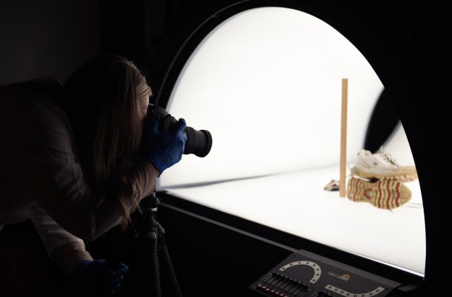 Sarah Davis,  digital forensic examiner, performs a photo demonstration during a laboratory visit March 28 in Forest Park, Georgia. The lab provides criminal investigators from every military branch with 24 forensic services ranging from DNA testing to latent print and trace evidence analysis.  