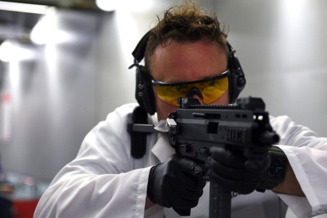 Ryan Coffey, USACIL firearms supervisor, poses for a photo during a laboratory visit March 28 in Forest Park, Georgia. The lab provides criminal investigators from every military branch with 24 forensic services ranging from DNA testing to latent print and trace evidence analysis.  