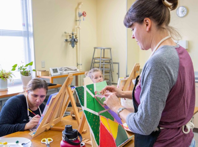 Community members participate in a “cookies and canvas” event at the Arts and Crafts Center as part of a Women's History Month celebration at Camp Zama, Japan, March 28, 2023. The Camp Zama community celebrated the observance with a week of various events to highlight and empower women on the installation.