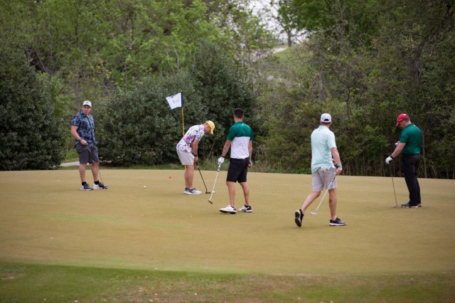 Golfers putt during the Ben Hogan Classic March 31 at the Courses of Clear Creek on Fort Hood, Texas. (U.S. Army photo by Blair Dupre, Fort Hood Public Affairs)