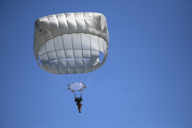 An airborne student prepares to make a parachute landing fall during the Basic Airborne Course at Fort Benning, Georgia, March 29. The three-week course teaches service members from every military branch how to safely conduct airborne operations. (U.S. Army photo by Staff Sgt. Dustin Biven)