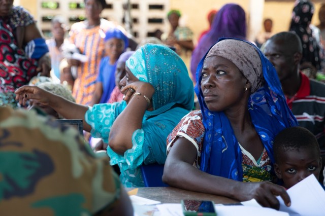 A woman waits for medical treatment in Yendi, Ghana, June 3, 2023, during a medical civic action program as part of exercise African Lion 2023.
