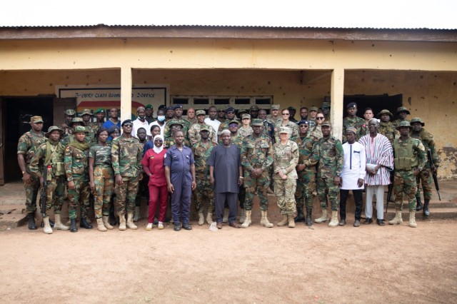 U.S. Army Soldiers and medical providers from the 352nd Civil Affairs Command and soldiers and medical providers from the Ghana Armed Forces pose for a group photo in Yendi, Ghana, June 3, 2023 during a medical civic action program as part of exercise African Lion 2023.