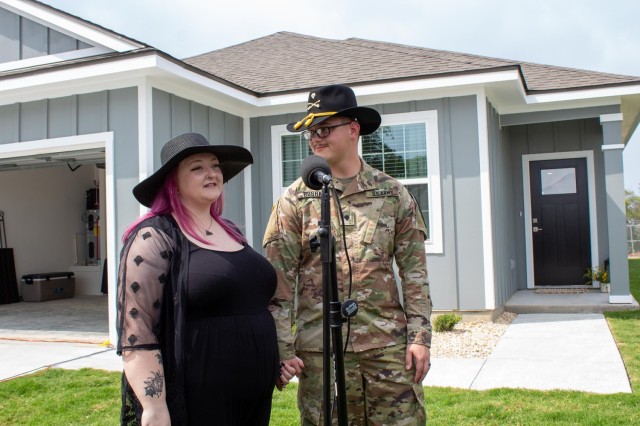 Allison and Spc. Grant Boshaw, 1st Air Cavalry Brigade, 1st Cavalry Division, speak following the ribbon-cutting ceremony June 16, 2023. They will be the first to receive a brand-new home in Heritage Heights at Fort Cavazos, Texas. (U.S. Army photo by Samantha Harms, Fort Cavazos Public Affairs)