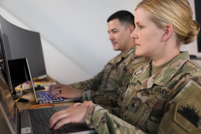 U.S. Army Sgt. Ashley Wagner, a signal support specialist with the California National Guard, simulates a cyber attack while acting as part of the Red cell team during Cyber Dawn, an annual training exercise in Sacramento, Calif. June 13, 2023.