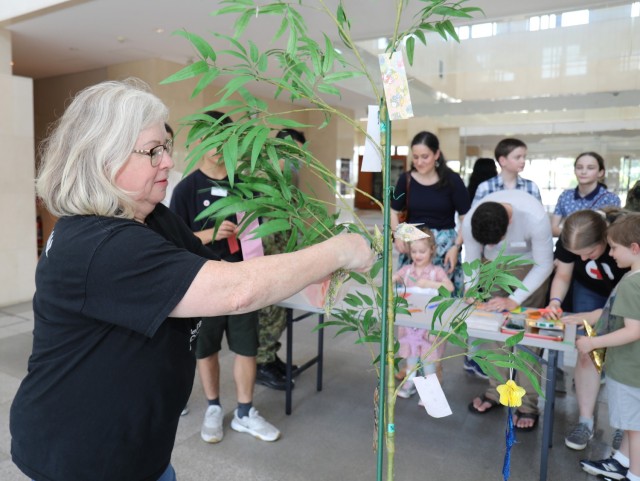 Tina Phillips, a volunteer with the Camp Zama American Red Cross, participates in an event to celebrate the "Tanabata" festival at Camp Zama, Japan, June 29, 2023. The Japan Ground Self-Defense Force's 4th Engineer Group hosted the event and invited community members to join in the celebration. 