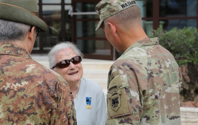 U.S. Army Maj. Gen. Todd R. Wasmund, commander of U.S. Army Southern European Task Force, Africa (SETAF-AF), right., welcomes guest of honor Ms. Paola Del Din at Caserma Del Din on Jun. 30, 2023. Members of the Vicenza military community, to include U.S. Army Southern European Task Force, Africa (SETAF-AF) and the 173rd Airborne Brigade, as well as local Vicenza civilian, military and police leaders met at SETAF-AF headquarters to conduct obersvance of Caserma Del Din's 10th anniversary. SETAF-AF provides U.S. Africa Command and U.S. Army Europe & Africa a dedicated headquarters to synchronize Army activities in Africa and scalable crisis response options in Africa and Europe. (U.S. Army photo by Staff Sgt. Luke Wilson)