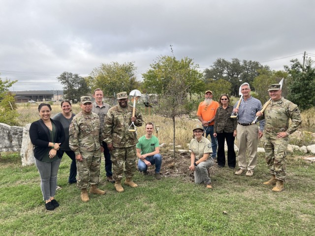 Timi Dutchuk, chief of environmental programs, Directorate of Public Works, poses with a representative from Texas A&M Forest Service, garrison command and DPW staff to celebrate Texas Arbor Day and Fort Cavazos’ recognition as a Tree City community for the 17th year in November 2022. (U.S. Army photo by Christine Luciano, DPW Environmental)