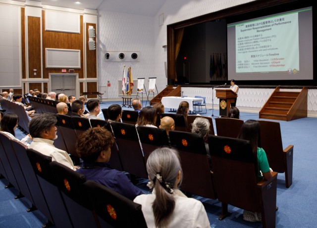 U.S. Army Garrison Japan employees attend a workforce town hall at Kizuna Hall on Camp Zama, Japan, Aug. 8, 2023.