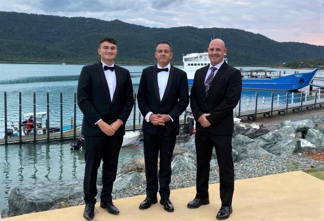 Capt. Jared McCully (left) poses for a photo during a charity black-tie event in Bowen, Australia as part of Talisman Sabre 23. McCully, along with a few other U.S. service members and an Australian counterpart, were invited to the  mayor’s annual banquet.
