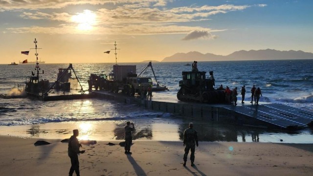 A ferry carrying heavy equipment makes landfall in Bowen, Australia, July 312, 2023. Soldiers, sailors and Coast Guardsmen assigned to Joint Task Force 7 are conducting logistics over-the-shore operations during Talisman Sabre 23, a biennial exercise designed to advance a free and open Indo-Pacific by strengthening partnerships and interoperability among key allies.