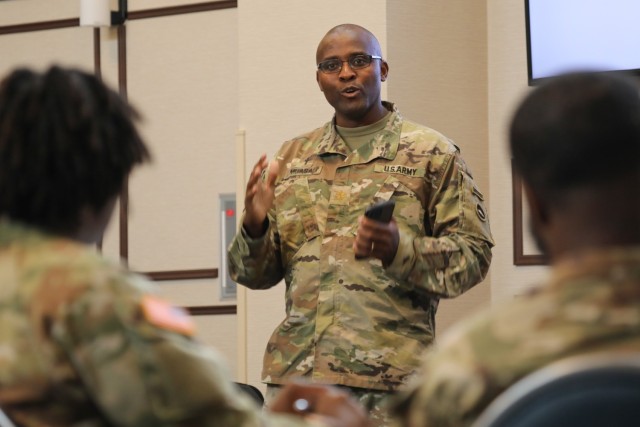 Maj. Cornelius Muasa, the 10th Support Group chaplain, conducts a devotion and prayer during a three-day summit at Camp Zama, Japan, Aug. 15, 2023. The summit, which was the first-ever conducted by USARJ, included sessions on leadership development, lessons learned and fiscal year planning, as well as team-building activities.