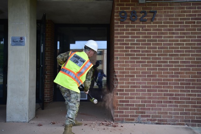 Fort Meade Garrison Command Team Honors Sgt. Clarence Leon ‘Boone’ McNeill with Ceremonial Demolition of McNeill Hall 