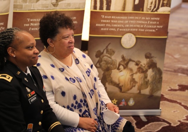 An Army chaplain poses for a photo with Harriet Tubman’s great-great-great grandniece, Ernestine Wyatt. 