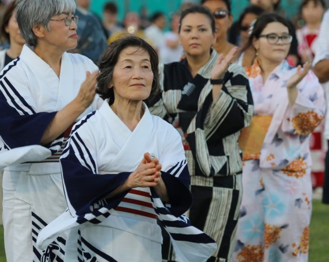 Bon Odori festival attendees perform a traditional dance at Camp Zama, Japan, Aug. 5, 2023. About 20,000 people attended this year's event, which honors the departed spirits of one’s ancestors. The Japanese festival has been celebrated at Camp Zama since 1959.