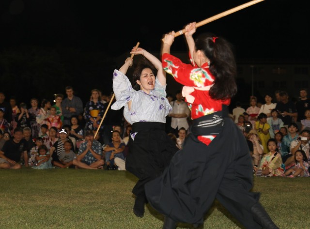 A Japanese "kendo" team, which translates to "the way of the sword," demonstrates its skills during the Bon Odori festival at Camp Zama, Japan, Aug. 5, 2023. About 20,000 people attended this year's event, which honors the departed spirits of one’s ancestors. The traditional Japanese festival has been celebrated at Camp Zama since 1959.