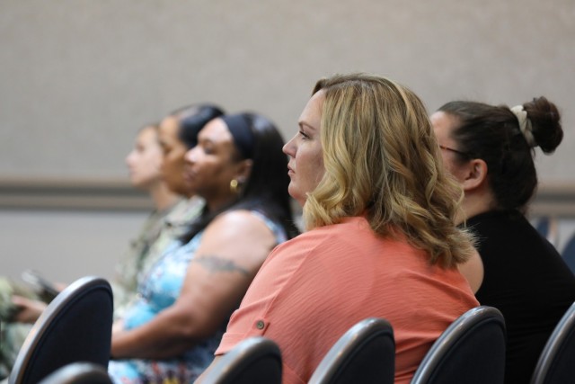 Community members attend a town hall hosted by U.S. Army Medical Department Activity–Japan at the Camp Zama Community Club, Japan, Aug. 29, 2023. The meeting announced a new health care option for civilians and the rollout of an electronic health record system, among other updates.