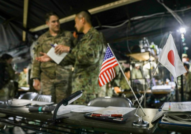 U.S. Army and Japan Ground Self-Defense Force leaders conduct a briefing during Orient Shield 23 at Kamifurano Training Area, Hokkaido, Japan, Sept. 14, 2023. Orient Shield is a bilateral U.S. Army and JGSDF field training and command post exercise that focuses on converging JGSDF Cross-Domain Operations and U.S. Army Multi-Domain Operations.