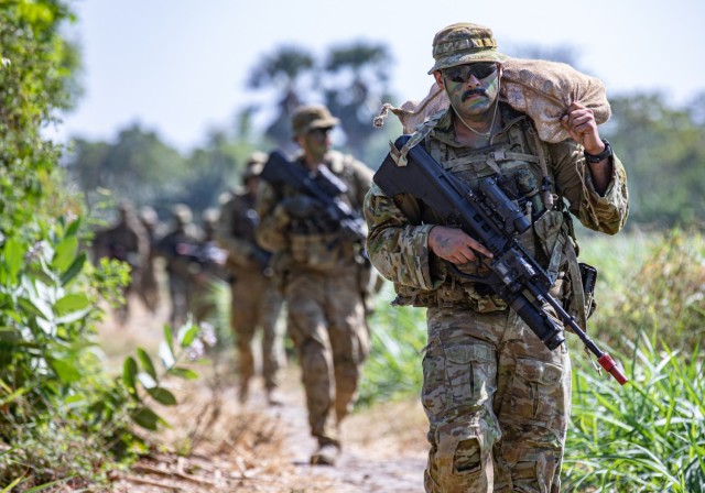 A group of Australian Defense Force (ADF) Soldiers, moves to their objective during a rehearsal for a Combat Live Fire Exercise during Exercise Super Garuda Shield 2023, at the 5th Marine Combat Training Center, Puslatpur, East Java, Indonesia., Sept. 9, 2023. Super Garuda Shield 2023 (SGS2023) is an annual exercise that has significantly grown in scope and size since 2009. SGS2023 is the second consecutive time this exercise has grown into a combined and joint event, highlighting the 7 participating and 12 observing nations' commitment to partnership and a free and open Indo-pacific. 
