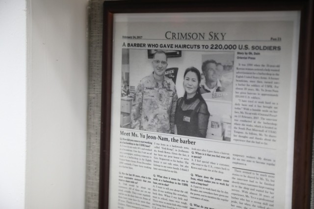 Barbershop employee provides more than 220,000 haircuts after 30 years of service to the Yongsan community