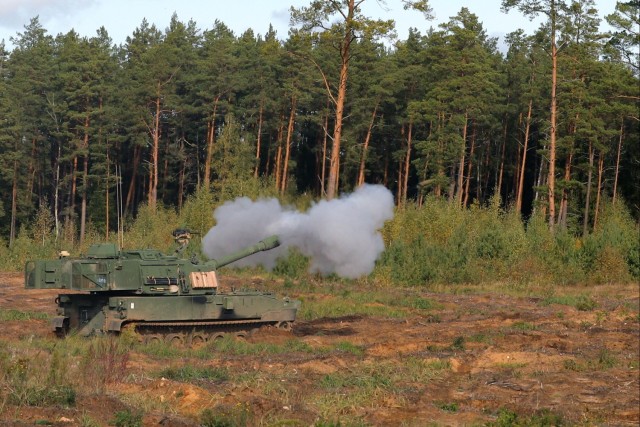 Task Force Marne Paladin crews provide artillery support during Exercise Iron Wolf