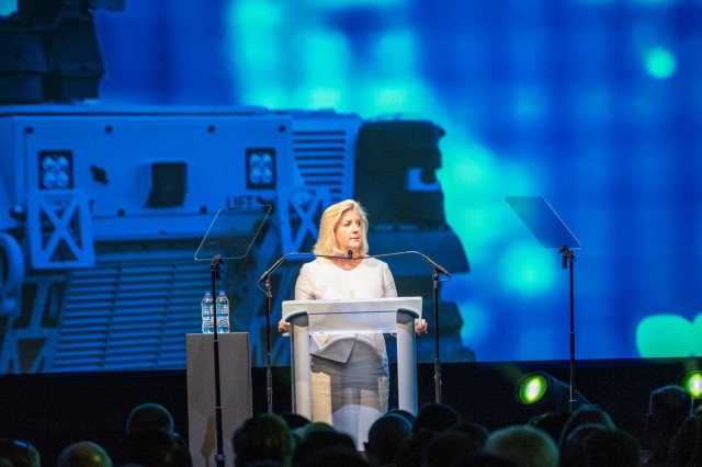 Secretary of the U.S. Army Christine E. Wormuth addresses the audience during the Opening Ceremony for the AUSA 2023 Annual Meeting and Exposition in the Ballroom of the Walter E. Washington Convention Center in Washington, D.C., Oct. 9, 2023.  The event was hosted by Military District of Washington.