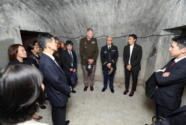 Several Shinto priests and members from the Association of Shinto Shrines visit the emperor's bunker during a tour of Camp Zama, Japan, Nov. 9, 2023. The U.S. Army Japan Chaplain’s Office invited them to the installation as part of an ongoing effort to increase interfaith dialogue with its unit ministry teams.