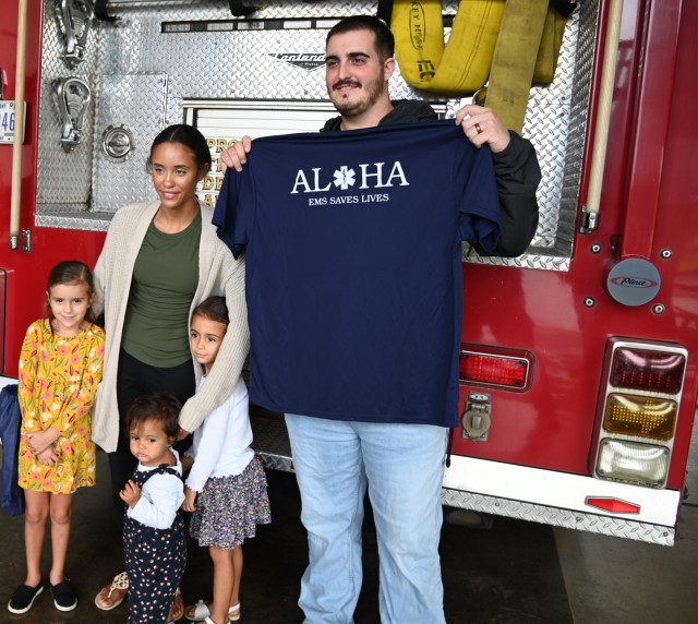  Sgt. Woodmansee and his wife, Brittany. This powerful image captures the spirit of unity and dedicated service that defines their life-saving mission under mutual aid agreements.