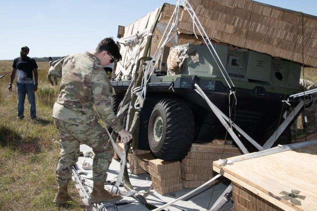  Airborne Soldiers drop test new Small Multipurpose Equipment Transport