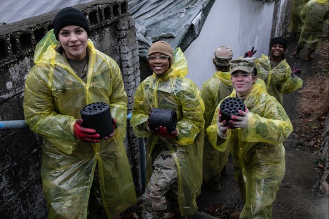 Camp Casey Soldiers deliver coal briquettes to underprivileged neighborhoods in the city of Uijeongbu