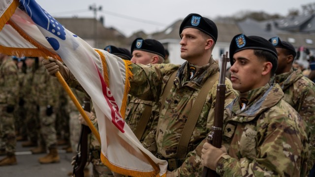 Soldiers from the 101st Airborne Division (Air Assault) march through Bastogne 2023