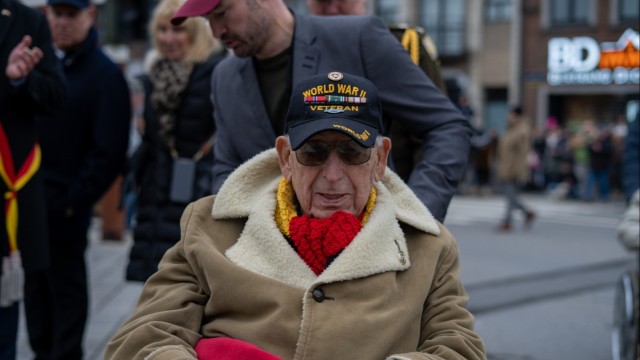 Soldiers from the 101st Airborne Division (Air Assault) march through Bastogne 2023