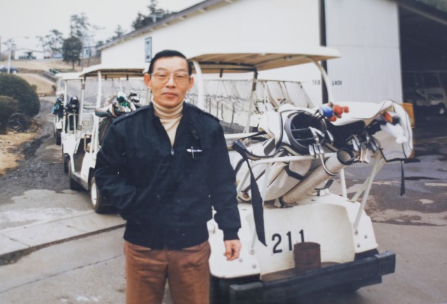 Tsuneo Yamagishi poses for a photo while working at the Camp Zama Golf Course in Japan. Yamagishi, now 95, worked more than 50 years at U.S. Army installations following World War II. 