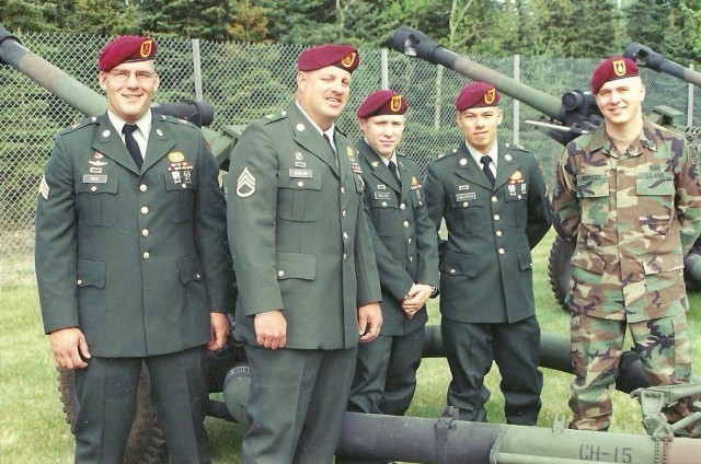 Then-Sgt. Rick Dean, left, poses for a photo with fellow artillerymen while at a Memorial Day event. Dean, now assigned to U.S. Army Aviation Battalion–Japan, recently marked the end of his 26-year career with a final flight at Camp Zama’s Kastner Airfield in Japan.