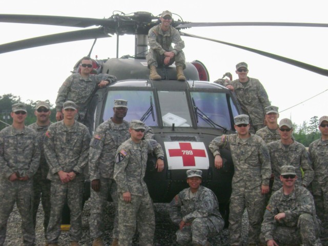 Chief Warrant Officer Rick Dean, second from left, poses for a photo with his teammates during training at the Joint Readiness Training Center at Fort Johnson, La. Dean, now assigned to U.S. Army Aviation Battalion–Japan, recently marked the end of his 26-year career with a final flight at Camp Zama’s Kastner Airfield in Japan.