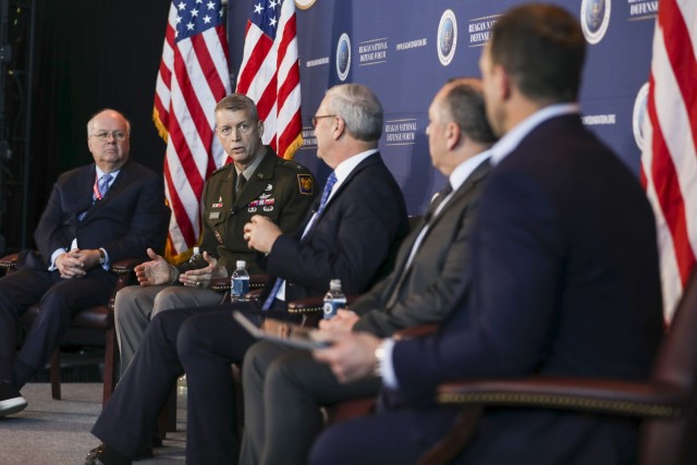 Army Gen. Daniel Hokanson, chief, National Guard Bureau, participates in a panel discussion at the 2023 Reagan National Defense Forum at the Ronald Reagan Presidential Library and Museum, Simi Valley, California, Dec. 2, 2023. Hokanson joined U.S. Sen. Kevin Cramer of North Dakota, Under Secretary of the Army Gabriel O. Camarillo, and Karl Rove to discuss how to boost military recruitment and readiness. (U.S. Army National Guard photo by Sgt. 1st Class Zach Sheely)