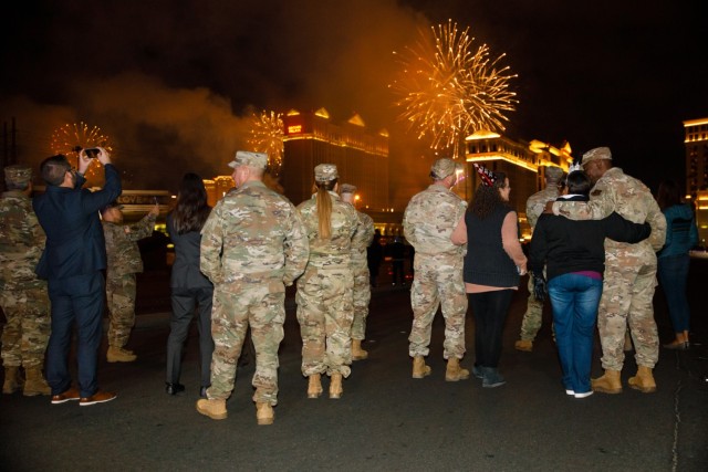 Nevada Guard leadership watch the fireworks over the Las Vegas Strip, Jan. 1, 2024. Nevada Guard leadership celebrated the new year after a successful New Year's Eve mission.