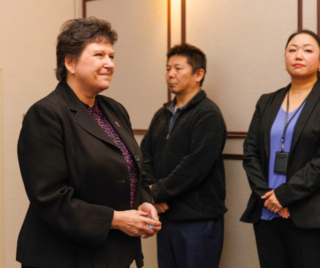 Brenda Lee McCullough, left, director of U.S. Army Installation Management Command–Pacific, recognizes U.S. Army Garrison Japan employees during her first official visit to Camp Zama, Japan, Jan. 8, 2024. McCullough received several briefings while visiting garrison assets, including housing units, support facilities and other infrastructure. 