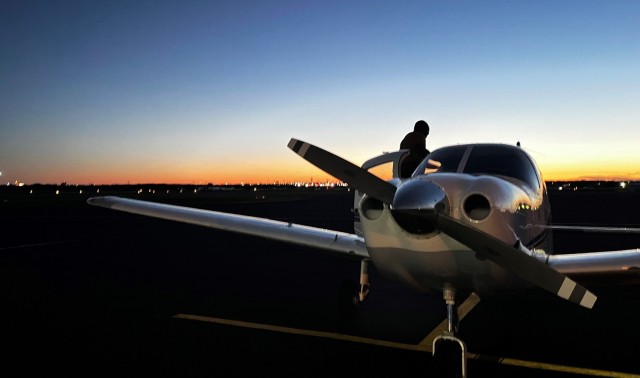 Sgt. 1st Class Lacy Harrell Jr. stands in his flight training aircraft. Harrell plans to take his family flying after he receives his private pilot's license.  