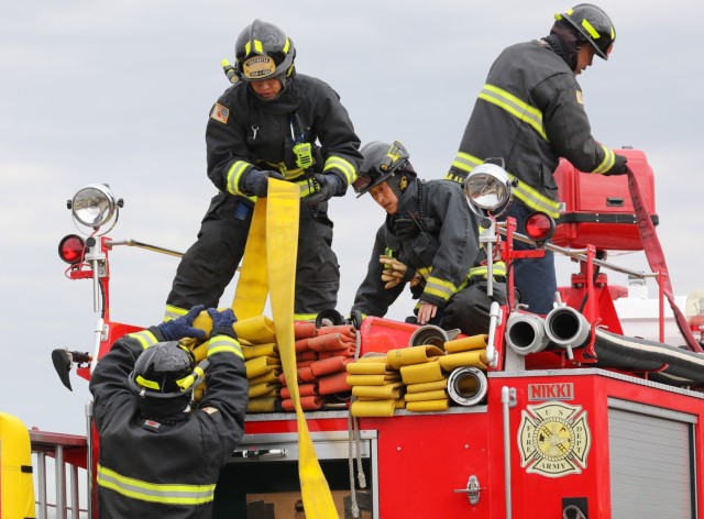 U.S. Army Garrison Japan firefighters participate in a downed aircraft exercise at Camp Zama, Japan, March 7, 2024. The firefighters arrived at the scene within two minutes while using radio communication to coordinate their efforts with the air traffic control tower.