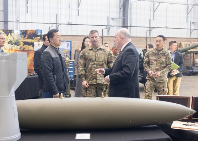 PICATINNY ARSENAL, N.J. - Mr. Young Bang, Principal Deputy Assistant Secretary of the Army Acquisition, Logistics and Technology (AL&T), receives a brief from the newly established Project Director, Joint Ammunition and Weapon Systems Office which supplies the joint warfighter with tactical munitions.