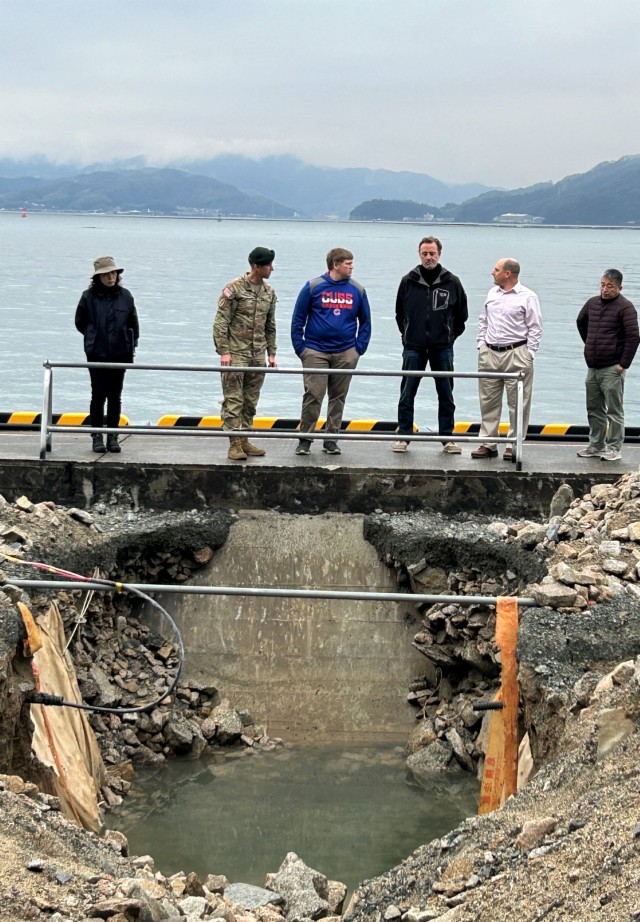 Members of the U.S. Army Corps of Engineers Japan District brief Col. Marcus Hunter, second from left, U.S. Army Garrison Japan commander, on the status of various ongoing construction projects during Hunter’s February trip to the Kure Ammunition District in Hiroshima, Japan.