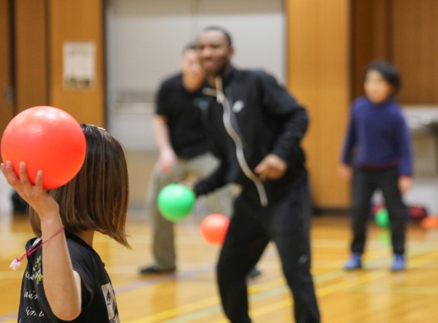 Community members participate in a dodgeball game with children from the Sagamihara Minami Children’s Home during an outreach event at Camp Zama, Japan, April 3, 2024. 