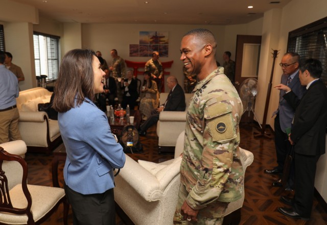 Col. J.P. Smith, right, command chaplain for U.S. Army Japan, speaks with April Cook, a founding member of the Tokyo Interfaith Council, during the council's visit to Camp Zama, Japan, April 11, 2024. During the event, council members and two Navy chaplains toured the installation while everyone exchanged information and ideas on how they can assist each other. 