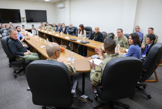 Col. J.P. Smith, lower right, command chaplain for U.S. Army Japan, speaks with members of the Tokyo Interfaith Council during their visit to Camp Zama, Japan, April 11, 2024. Council members and two Navy chaplains toured the installation while everyone exchanged information and ideas on how they can assist each other. 