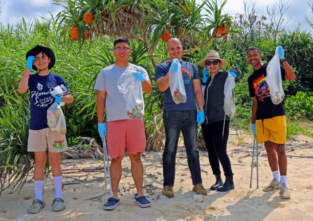Volunteers on Okinawa work together to beautify beach on Earth Day