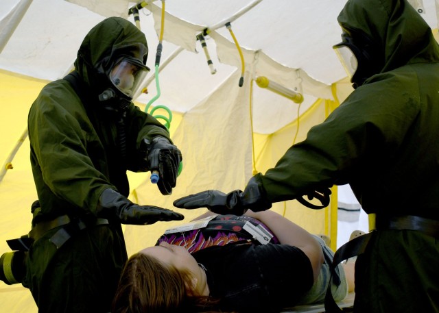 JOINT BASE MCGUIRE-DIX-LAKEHURST, N.J. – U.S. Army Soldiers from the New York National Guard’s 222nd Chemical Company, 104th Military Police Battalion, perform a decontamination wash of a simulated casualty during search and extraction operations during a training exercise, April 17, 2024.  Led by personnel from the 42nd Infantry Division making up the Region II Homeland Response Force, the week-long exercise brought together elements from across the New York National Guard and others to test their capability to conduct casualty assistance, decontamination, medical triage, and fatality search and recovery to save lives and mitigate human suffering.